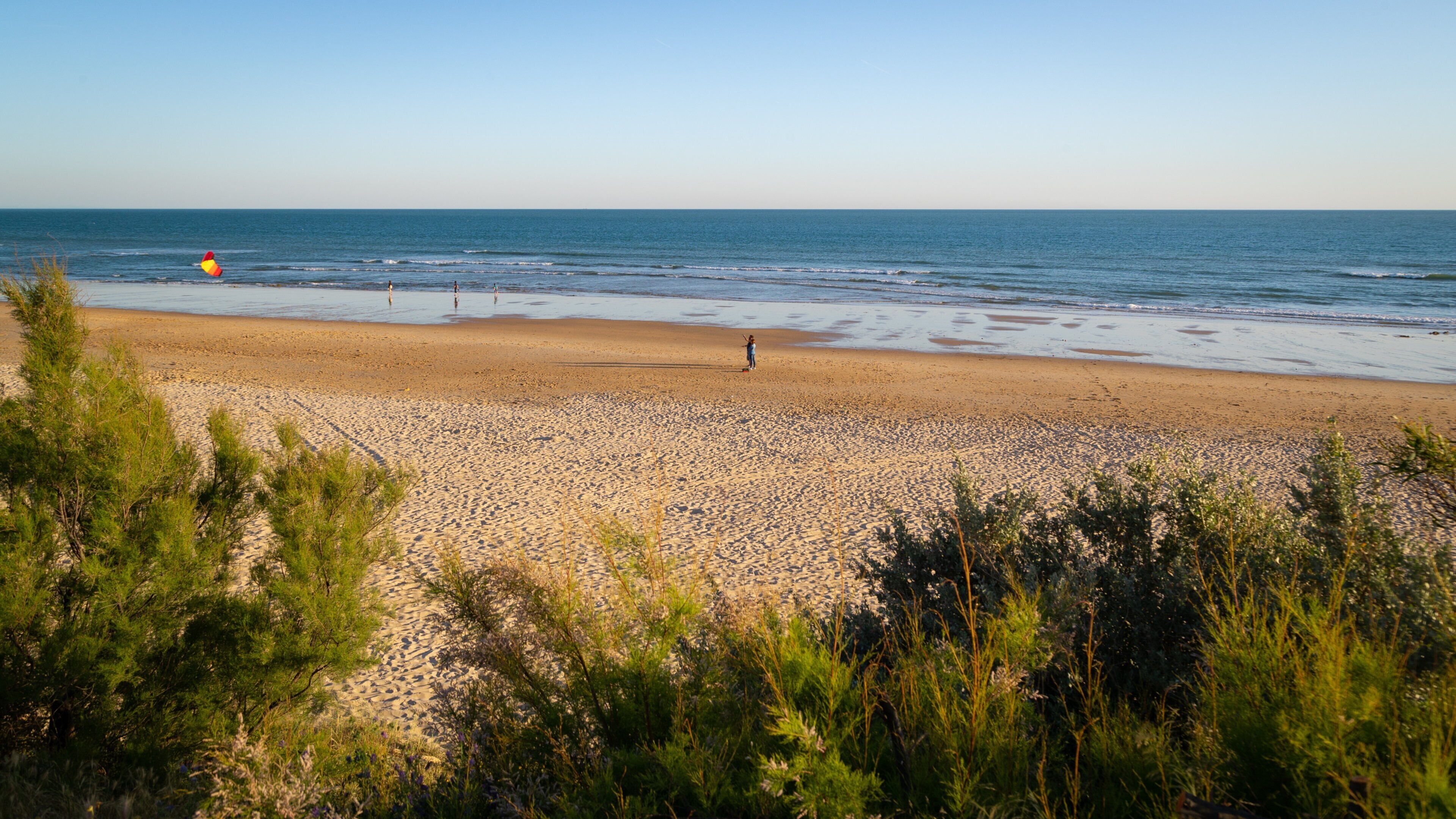 La Barrosa Beach which includes a beach and general coastal views