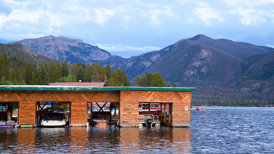 Grand Lake which includes a bay or harbour, a lake or waterhole and mountains