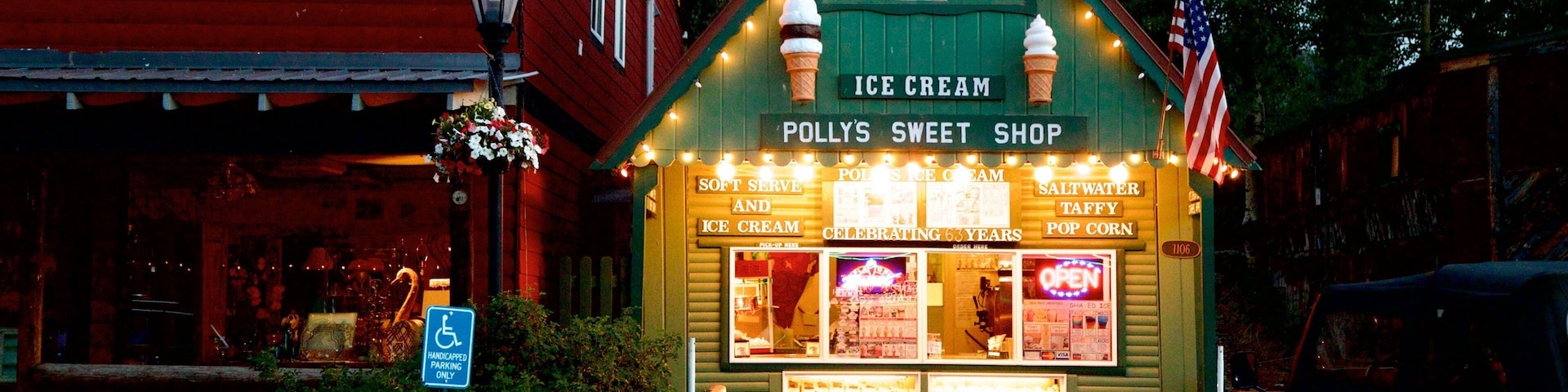 Grand Lake showing night scenes and signage