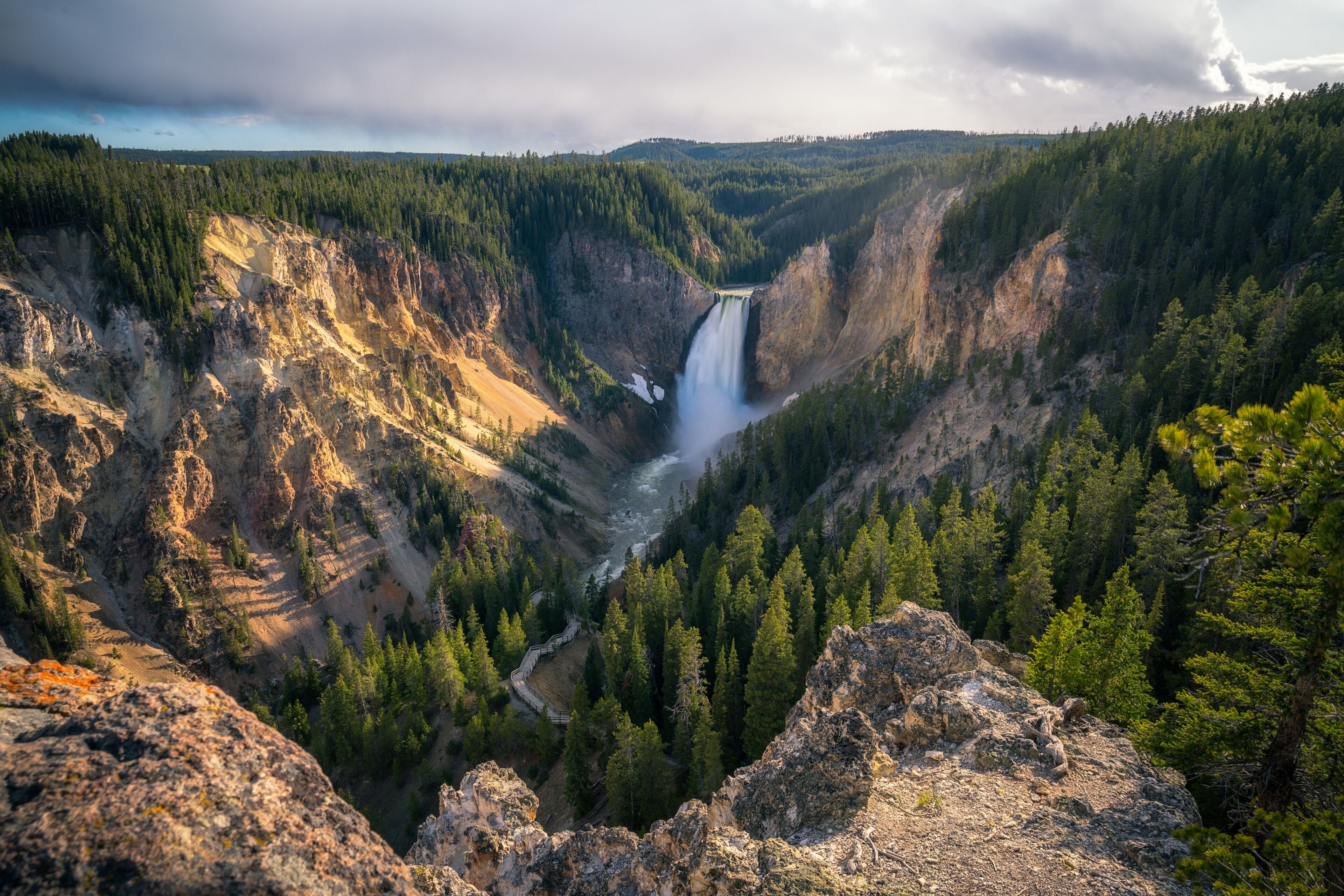 lower falls of the yellowstone national park at sunset, wyoming, usa
