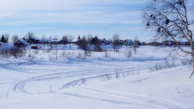 Karesuando which includes tranquil scenes and snow
