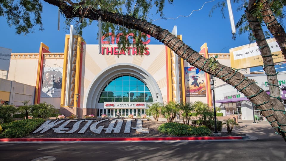A large outdoor cinema with a prominent 'AMC THEATRES' sign.