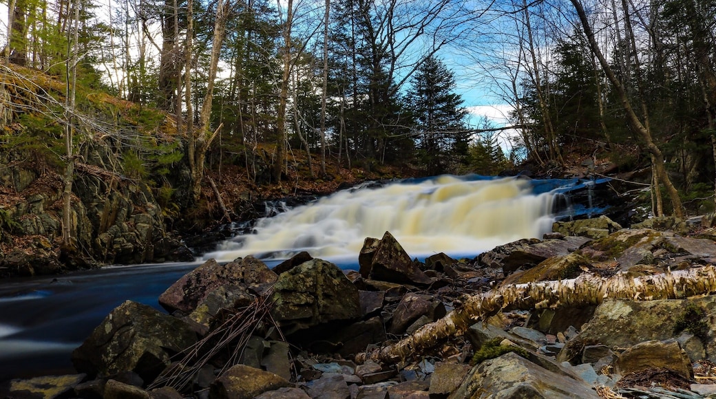 Miller's Falls off of the Old Guysborough Road. From the highway 118 exit in Fall River turn right at the lights and drive about 4km on Old Guysborough Road until you come accross the birdge over the river. Walk along that river about 200 feet and you're there.