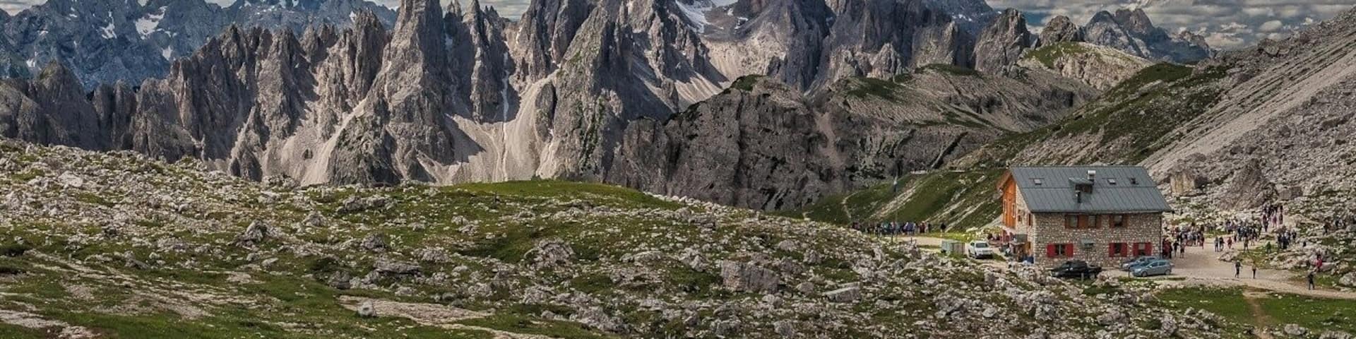 July 2016
Cadini di Misurina, Dolomites, South Tyrol land, Italy
Cadini di Misurina is a small mountain group in the south of Sexten Dolomites. It is made of spectacular limestone jagged towers and its name refers to the Misurina lake bellow them. You can admire them from the neighbouring Monte Piano or Tre Cime. In the picture taken from above the Rifugio Lavaredo hut (in the picture) you can see the highest part, namely the (from left) spiky Torre Siorpaess (2.556 m), massive Cima Cadin di Nord Est (2.788 m), the steep snow covered valley of Cadin del Nevaio with the Forcella del Nevaio (2.825 m) and Torre del Diavolo (2.726 m).