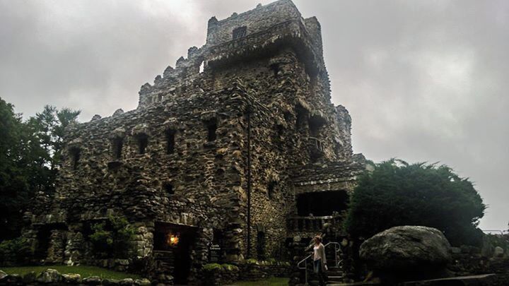 One New Years Eve, my sister and I made the decision to drive up to Maine, as far east as we could get to be among the first to see the sun rise New Year's Day in America.  On our way back from this pretty epic adventure (it was a long drive considering both of us had worked until about 10 pm New Years Eve!), we passed by a sign for Gilette Castle in Connecticut.  On a whim we decided to stop by- because adventure was what this trip was all about!  Well, we found it which was no easy feat.  We took all back roads which were not lit and it was pretty dark by the time we made it there.  The castle tours were closed for the season but we did get the opportunity to walk around the absolutely beautiful park that the castle sat on.  We were blown away- this place was incredible!  We vowed to make the trip again during the summer when it was warm and hopefully still daylight!

And that is what this picture is from.  It took several years but we did make it back!  It was June, so all of the trees are in full bloom and it made a stroll through the park just perfect.  We got to check out the outside of the castle in depth (unfortunately we were too late in the day for an inside tour, but peeking through the windows let me see how fancy-pants it was in there).  

Here is what I learned: This castle was built in 1919 (well, that's when it was finished anyway) for the famous produced/actor William Gilette, who was best known as the original Sherlock Holmes!  He designed what he wanted and this was the home he retired to!  I couldn't picture a more fitting place.  

If you happen to be in the area, check out this tucked away spot in Connecticut.  The drive alone is exquisitely beautiful and worth it!