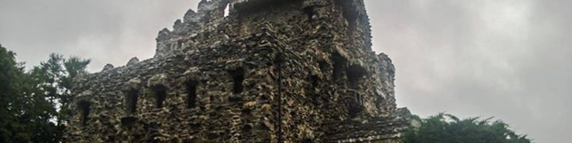 One New Years Eve, my sister and I made the decision to drive up to Maine, as far east as we could get to be among the first to see the sun rise New Year's Day in America. On our way back from this pretty epic adventure (it was a long drive considering both of us had worked until about 10 pm New Years Eve!), we passed by a sign for Gilette Castle in Connecticut. On a whim we decided to stop by- because adventure was what this trip was all about! Well, we found it which was no easy feat. We took all back roads which were not lit and it was pretty dark by the time we made it there. The castle tours were closed for the season but we did get the opportunity to walk around the absolutely beautiful park that the castle sat on. We were blown away- this place was incredible! We vowed to make the trip again during the summer when it was warm and hopefully still daylight!
And that is what this picture is from. It took several years but we did make it back! It was June, so all of the trees are in full bloom and it made a stroll through the park just perfect. We got to check out the outside of the castle in depth (unfortunately we were too late in the day for an inside tour, but peeking through the windows let me see how fancy-pants it was in there).
Here is what I learned: This castle was built in 1919 (well, that's when it was finished anyway) for the famous produced/actor William Gilette, who was best known as the original Sherlock Holmes! He designed what he wanted and this was the home he retired to! I couldn't picture a more fitting place.
If you happen to be in the area, check out this tucked away spot in Connecticut. The drive alone is exquisitely beautiful and worth it!