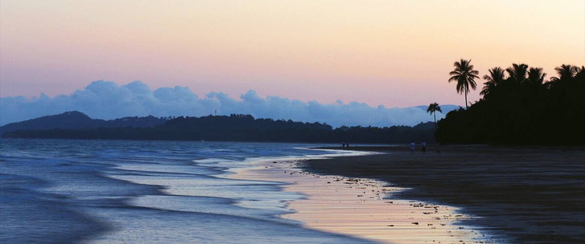 Mission Beach featuring a sunset and a sandy beach