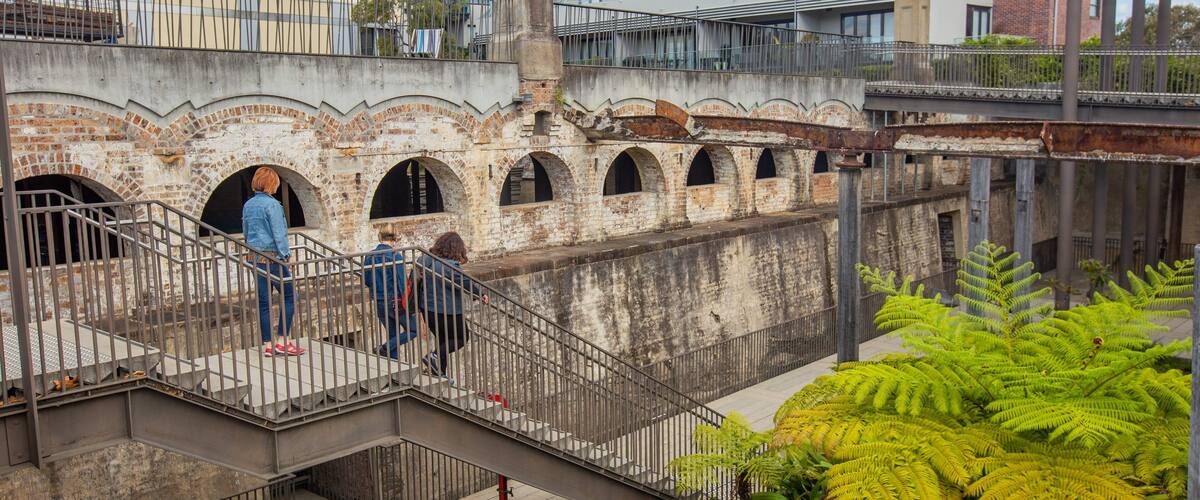 Paddington showing heritage elements as well as a small group of people