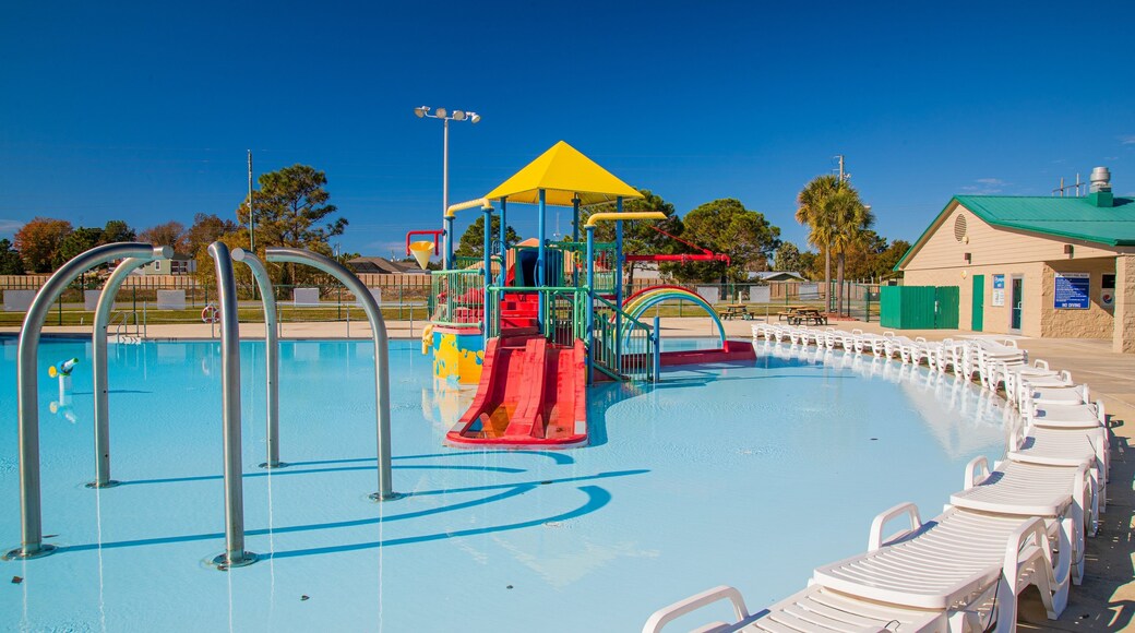 Frank Brown Park showing a pool and a playground