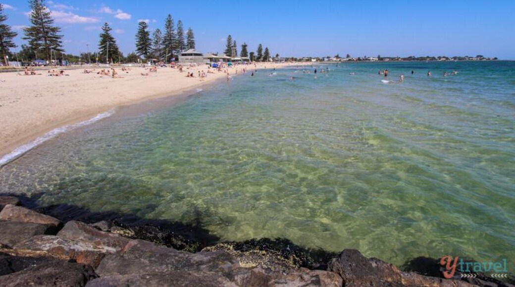 Elwood Beach in Melbourne is a popular bayside beach during sunny days and a great family beach. It’s not as accessible from the city as St Kilda as it’s not exactly on the tram or train line, but still only 8km’s away if you have a car, or jump in a cab.
The water was clean and calm for swimming and our kids had a great time playing on the sand and the rocks. It’s another fairly active beach and you’ll see people windsurfing, cycling, playing cricket and walking.