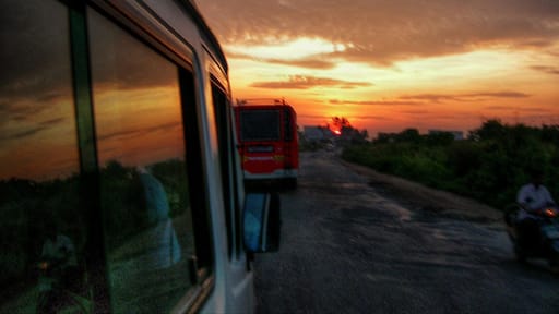 Bus rides are definitely under-rated for being a fantastic, inexpensive, sometimes bone-jarring, and frequently scenic way to see some of the countryside of India.
This photo was near the end of a rather long ride from Chennai with only a couple stops, but sometimes scenery was worth the sometimes bumpy ride.