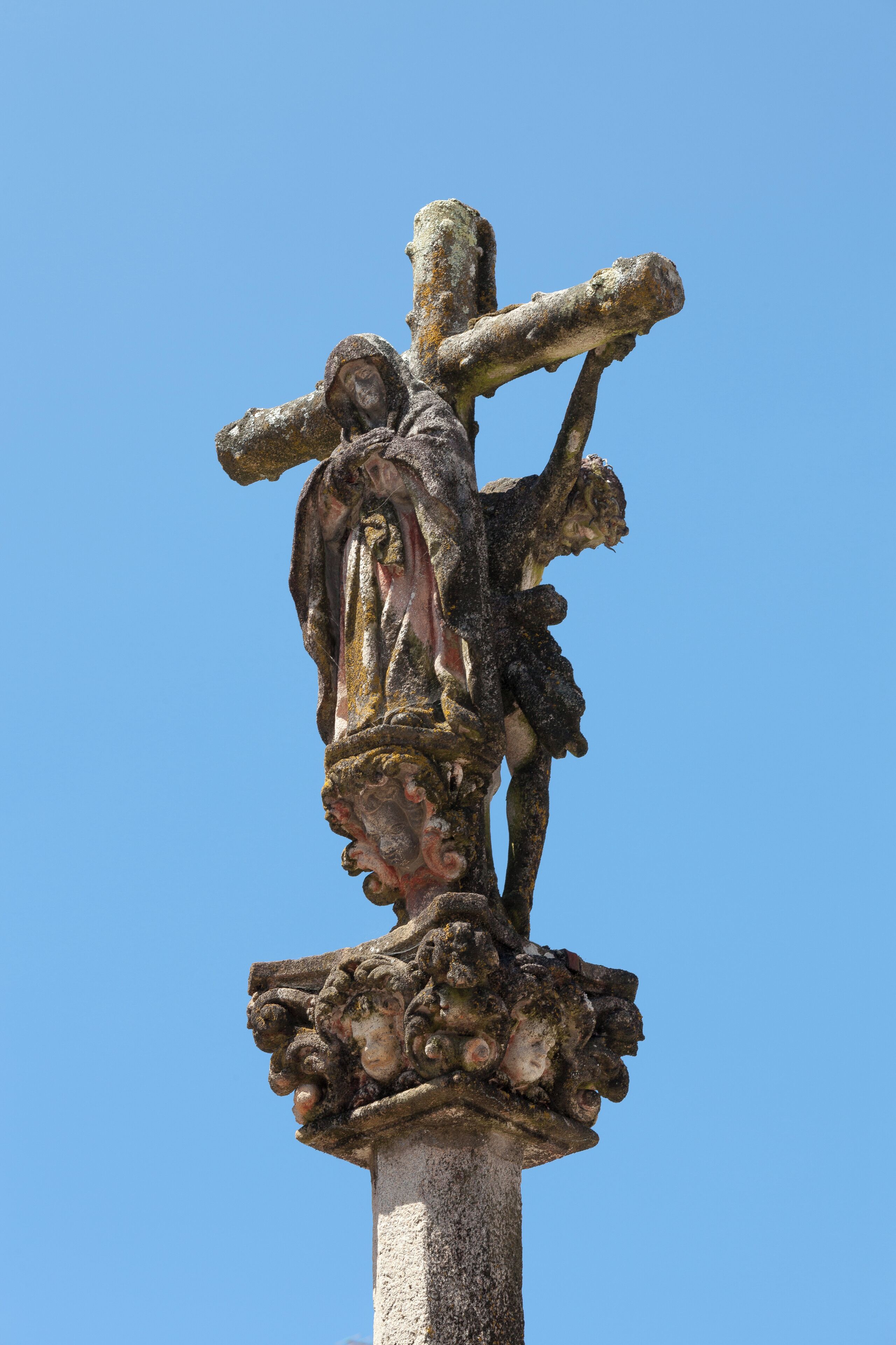 Baroque wayside cross in Rafael Dieste square, Rianxo, Galicia (Spain).