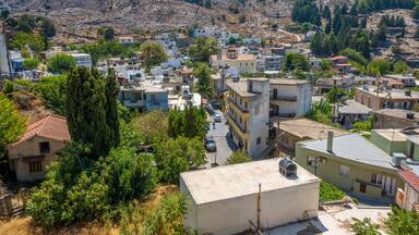 Aerial view of Anogeia in central Crete., Greece. A traditional mountainous cretan village.