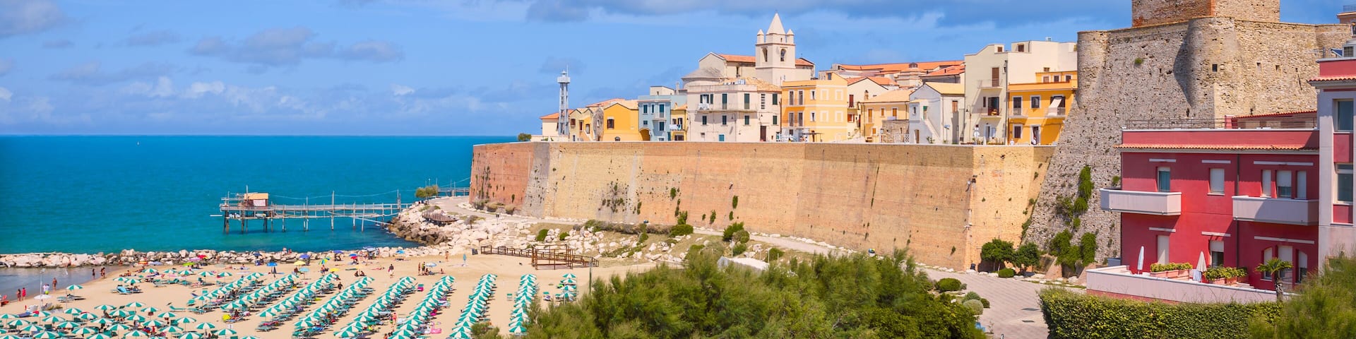 Panoramic view of the old town of Termoli with the defensive walls, the colorful houses and Svevo Castle, Termoli, Italy