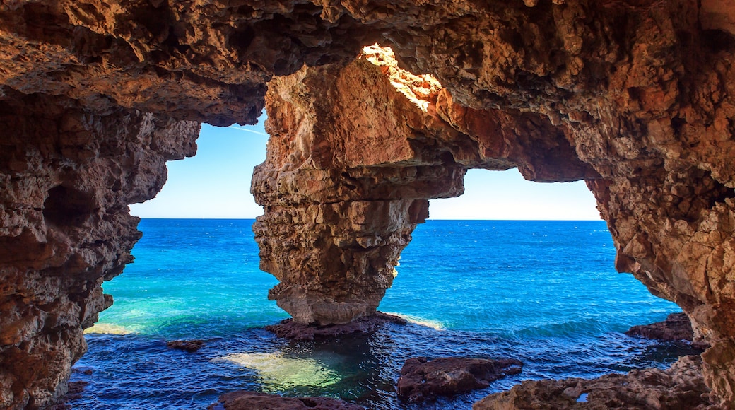 Natural cave on the coast in Spain, Moraira, Alicante, Cova dels Arcs