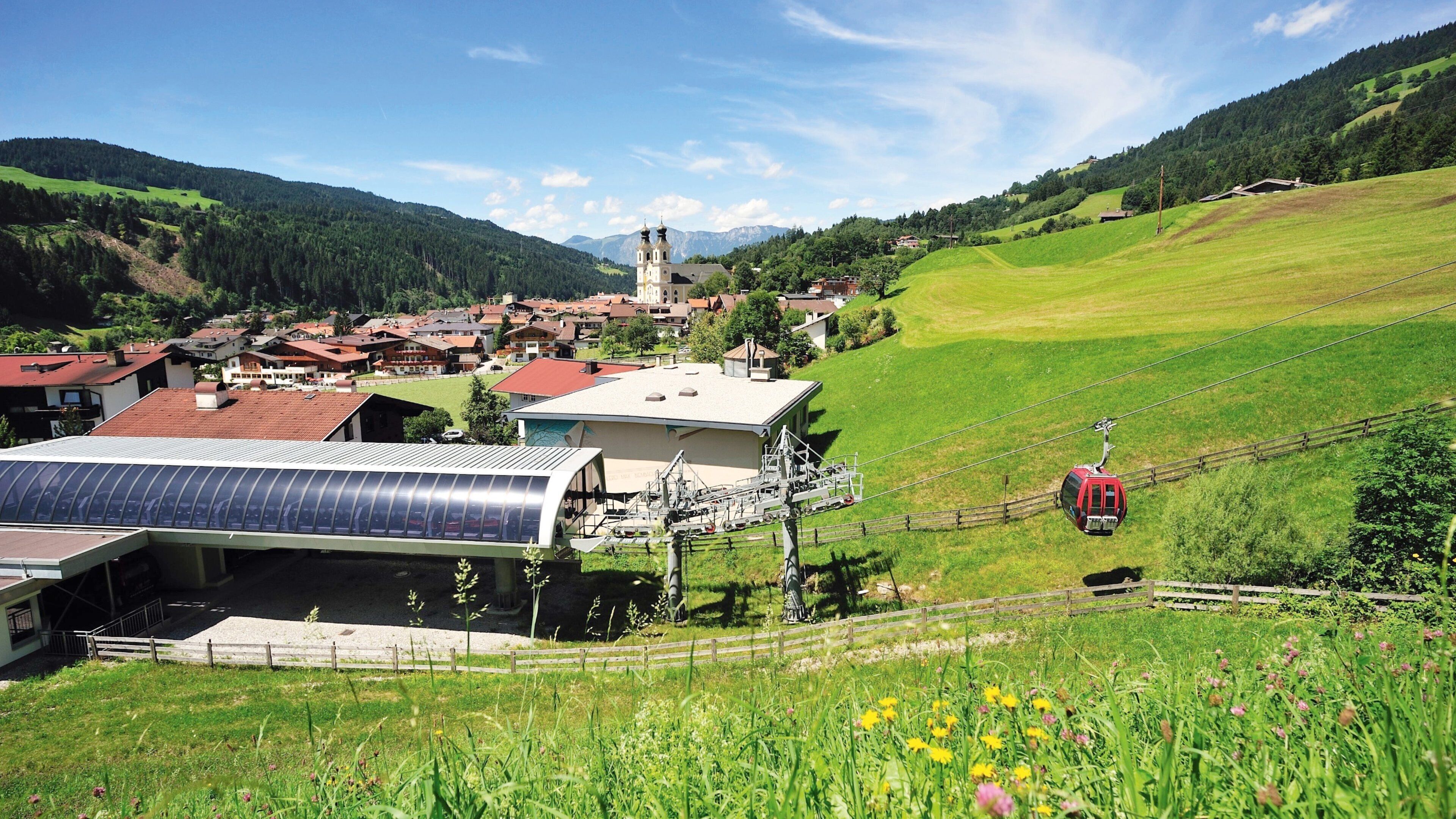 Hopfgarten im Brixental featuring a small town or village and a gondola