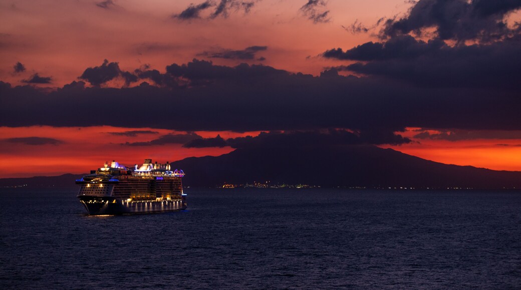 Photo of a ship at sunset shot from Manila bay, Philippines