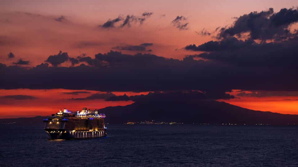 Photo of a ship at sunset shot from Manila bay, Philippines