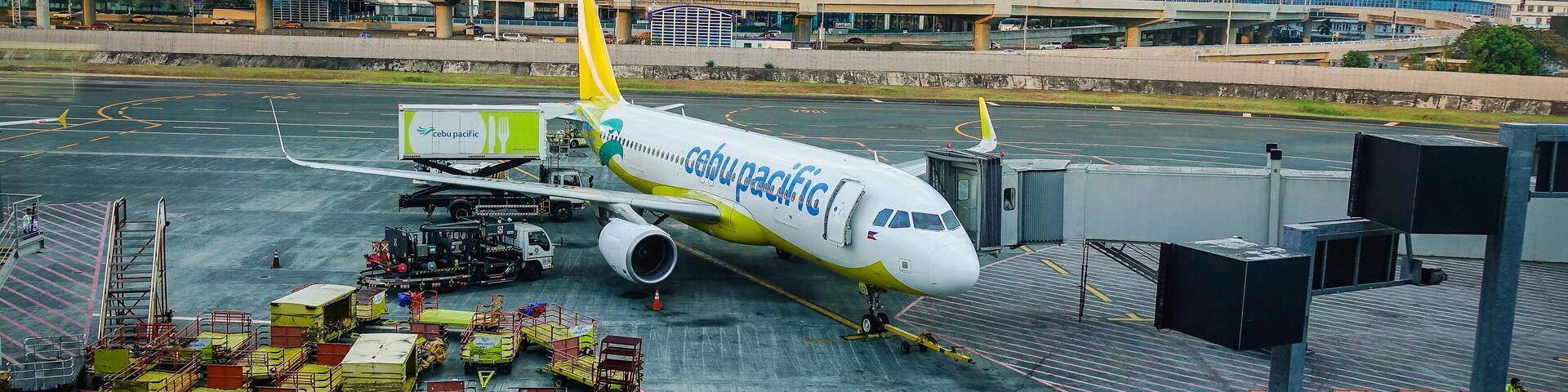 JJTBRC Manila, Philippines - Apr 14, 2017. A civil aircraft docks at Terminal 3 of Ninoy Aquino Airport (NAIA) in Manila, Philippines. NAIA is the main intl
