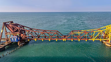 Pamban Bridge is a railway bridge which connects the town of Mandapam, India.