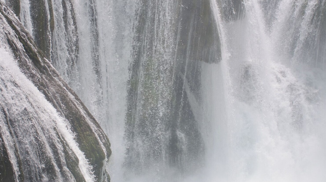 'Was the sun going to shine on us the following day?
It did! Early wake up, breakfast by Una, and we were at our starting point before we knew it – this time in the newly-established Una National Park. Our day on the river started with the usual training before hitting the big waterfalls at the start of the route. As we approached Štrbački Buk, we got out of our raft and walked/climbed for some minutes on the right bank, waiting for our boat and our skipper to join us after the 18-metre waterfall. We knew what we had in store: a 4-metre waterfall and some tricky smaller waterfalls cascading down to another section whose usual rocks we couldn’t see, because the water level was very high. In fact, I didn’t remember to have seen Una that foamy and rich. Ever.'
#Waterlust