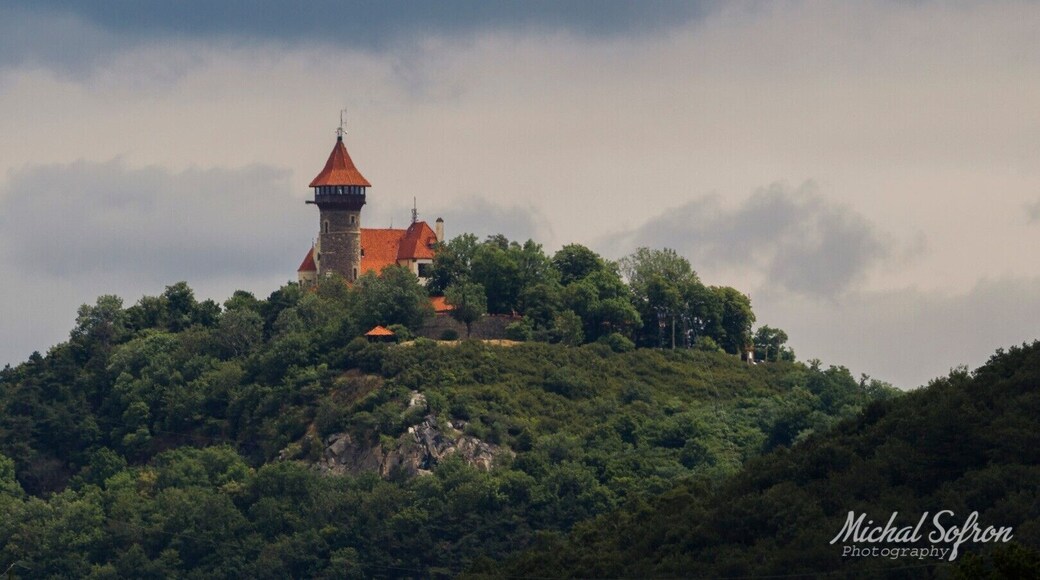 A place overlooking Hněvín Castle. You need to go through the hole in the fence and use the telephoto lens.