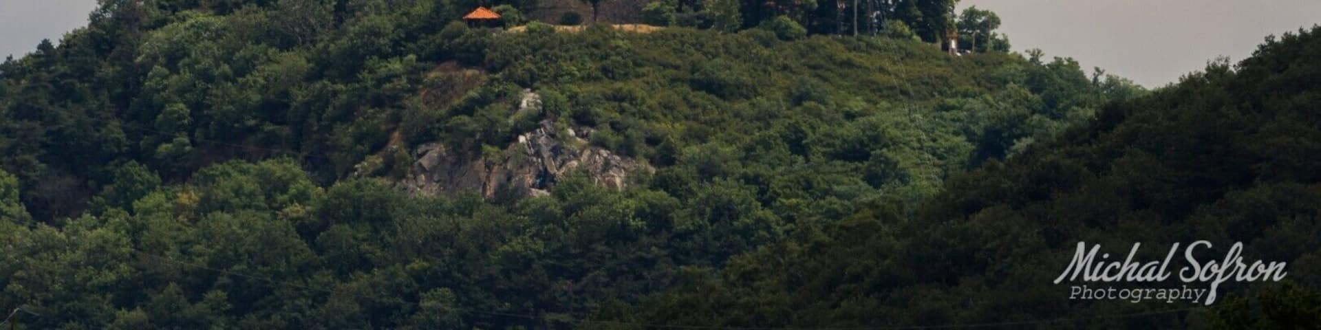A place overlooking Hněvín Castle. You need to go through the hole in the fence and use the telephoto lens.