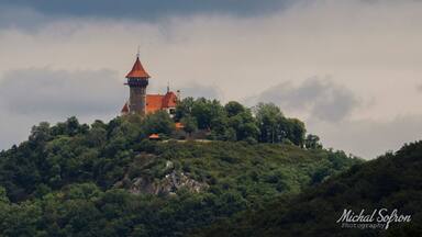 A place overlooking Hněvín Castle. You need to go through the hole in the fence and use the telephoto lens.