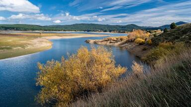 Spezzano della Sila, Cosenza district, view of Lake Cecita with autumn colors, Sila National Park, Calabria, Italy