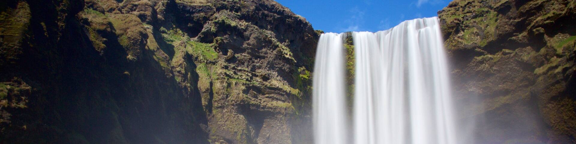 A waterfall with a rainbow.