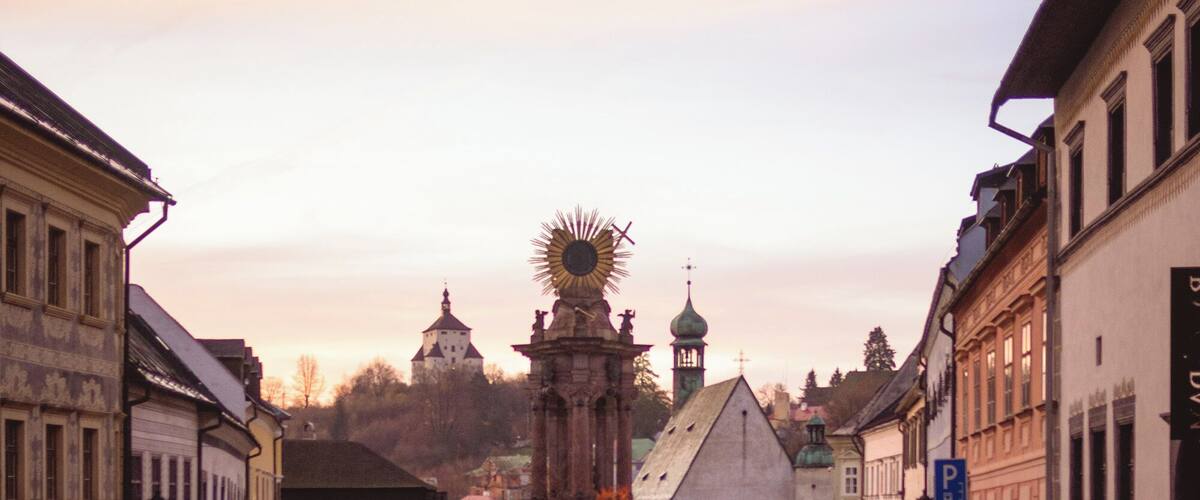 Banská Štiavnica is a picturesque and photogenic town. There are churches, palaces of rich miners and town houses standing in the narrow valley, small mining houses are cringing in the hills above them. All of this is inter-linked by little romantic streets and paths with hundreds of stairs. Do not miss Štiavnica promenade – an elevated pathway Trotuár, Ružová Street. In case you are interested in beautiful views, walking higher is worth it.