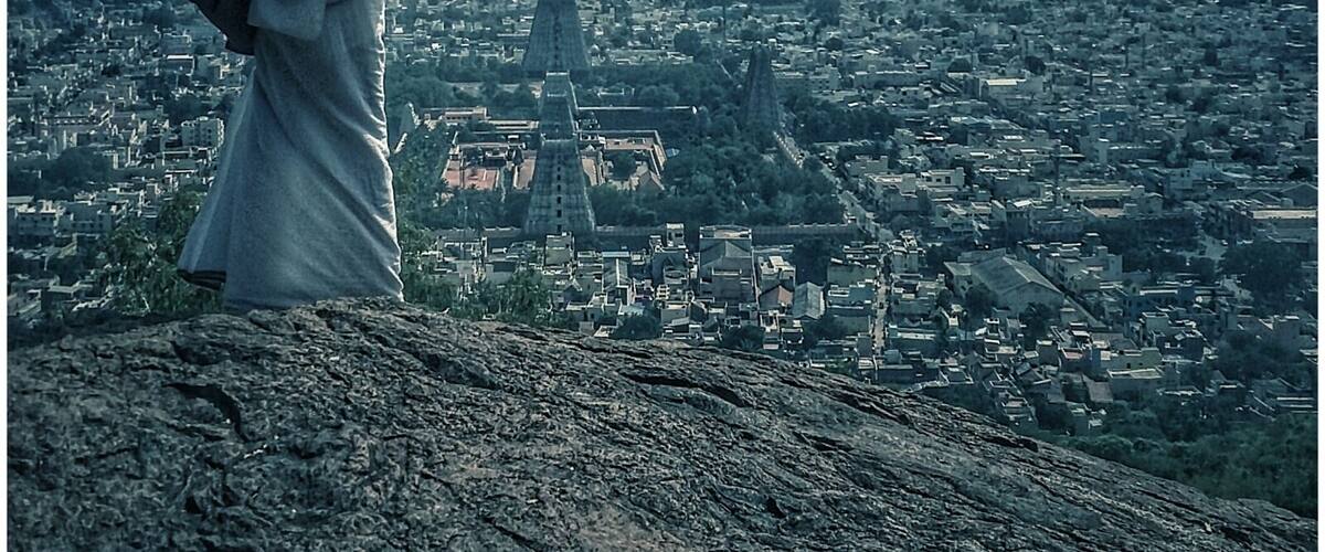 Sri ramana maharshi ashram is a calm spiritual place to find your inner peace.
They offer free stay and food for few days .
You have to contact them via mail.
Enchanting view from Arunachala mountain.
When you climb up to the meditation cave you can sit together with the monkeys as Sri Ramana Maharashi did it once