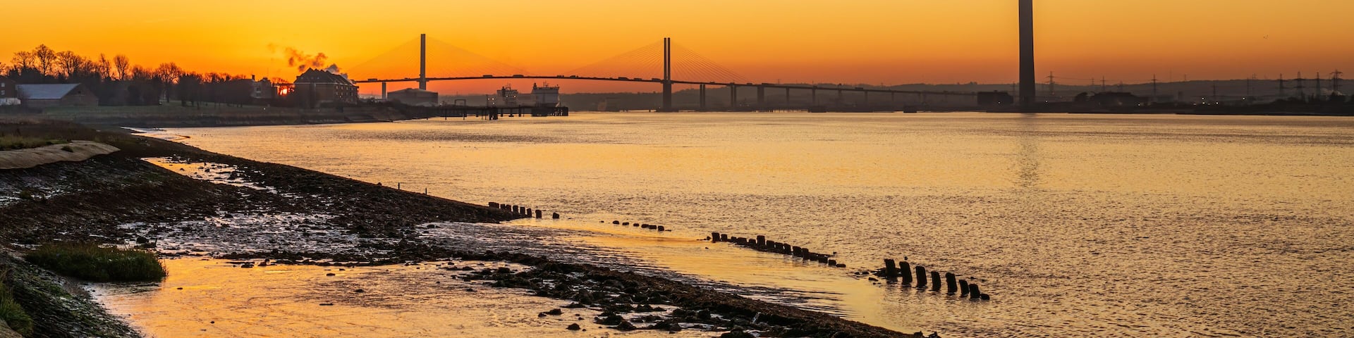 The River Thames leading towards The Queen Elizabeth II bridge, early morning, near Dartford, Suf