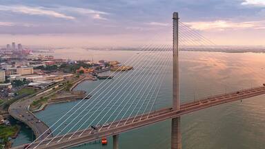 Dawn over the Cebu Cordova Link Expressway in Cebu City Philippines. Aerial View.