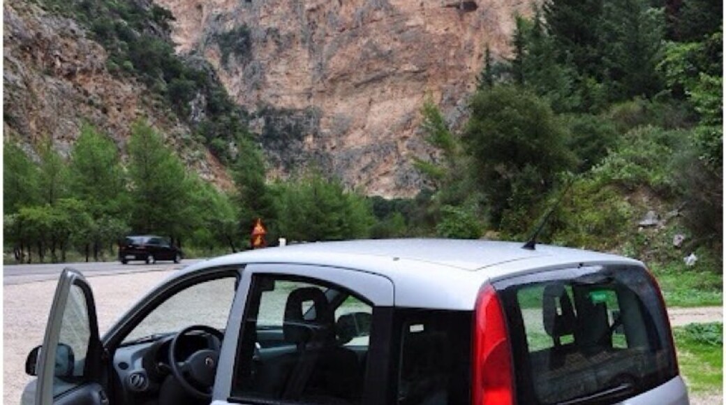 Driving through the gorge of Kleisoura.
The monastery of Panaghia Eleousa is carved in a rock on the gorge's limestone walls.
