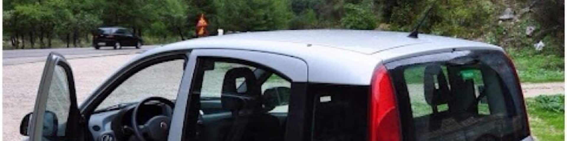 Driving through the gorge of Kleisoura.
The monastery of Panaghia Eleousa is carved in a rock on the gorge's limestone walls.