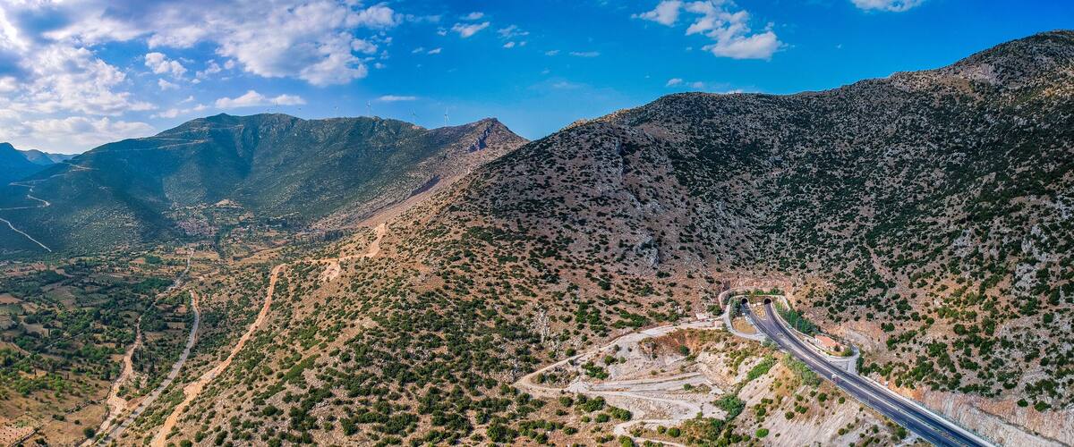 Moreas Motorway at Artemisio mount. A7 begins just west of the Isthmus of Corinth, branching off from Greek National Road 8A connecting Corinth and Kalamata via Tripoli, Greece