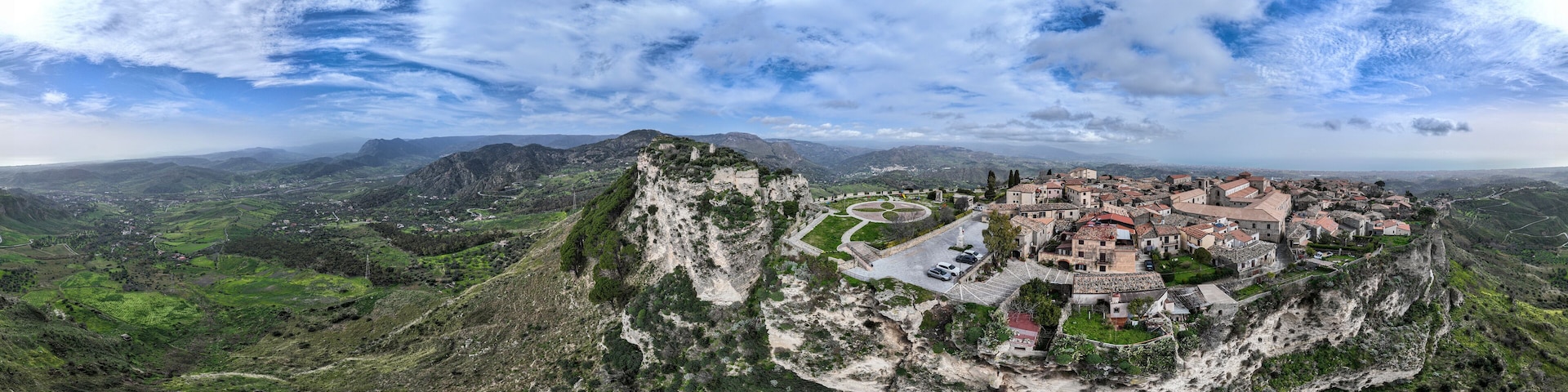 Aerial view of Gerace, Reggio Calabria, in the Aspromonte National Park. Norman Castle of Gerace. Historic center with a medieval feel. Calabria, Italy