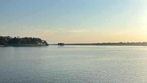 Relaxing lakefront view at Cedar Creek Reservoir in Texas during golden hour