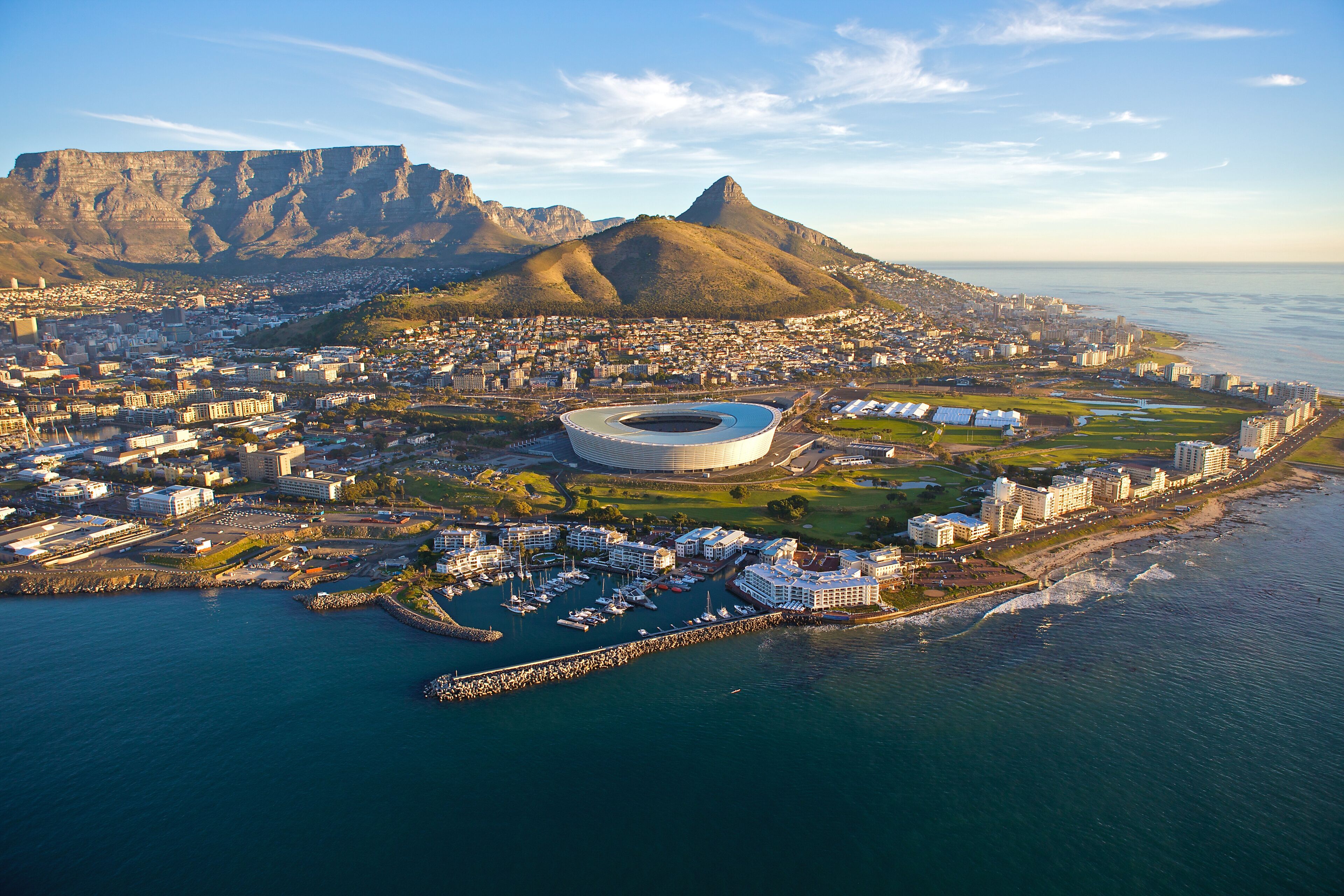 An aerial photograph of the  beautiful city of Cape Town, South Africa. with Table Mountain and Lions Head visible in the background