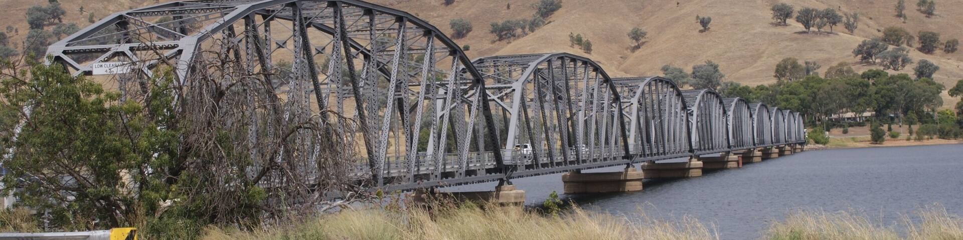Bethanga Bridge built in 1930 leading to the town of Bellbridge in Victoria Australia.
Water level in Hume Weir is high. The concrete foundations are quite high. See other photo by traveller LesleyHC.
