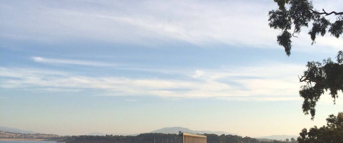 The Hume Dam with dusk tones on Good Friday, 2015.
The Hume Dam is a gated concrete gravity dam across the Murray River and downstream of the Mitta Mitta River. It provides flood mitigation, hydroelectricity, irrigation, water supply and conservation.
The reservoir now known as Lake Hume has the capacity of six times the water in Sydney Harbour, Australia. Notably in 2007, during the ten year drought, capacity fell to 1%.
It's a big structure and I had to stand afar to capture it on my trusty iPhone. All said I loved it and really enjoyed the colours and shadows.
#Australia Easter #roadtrip