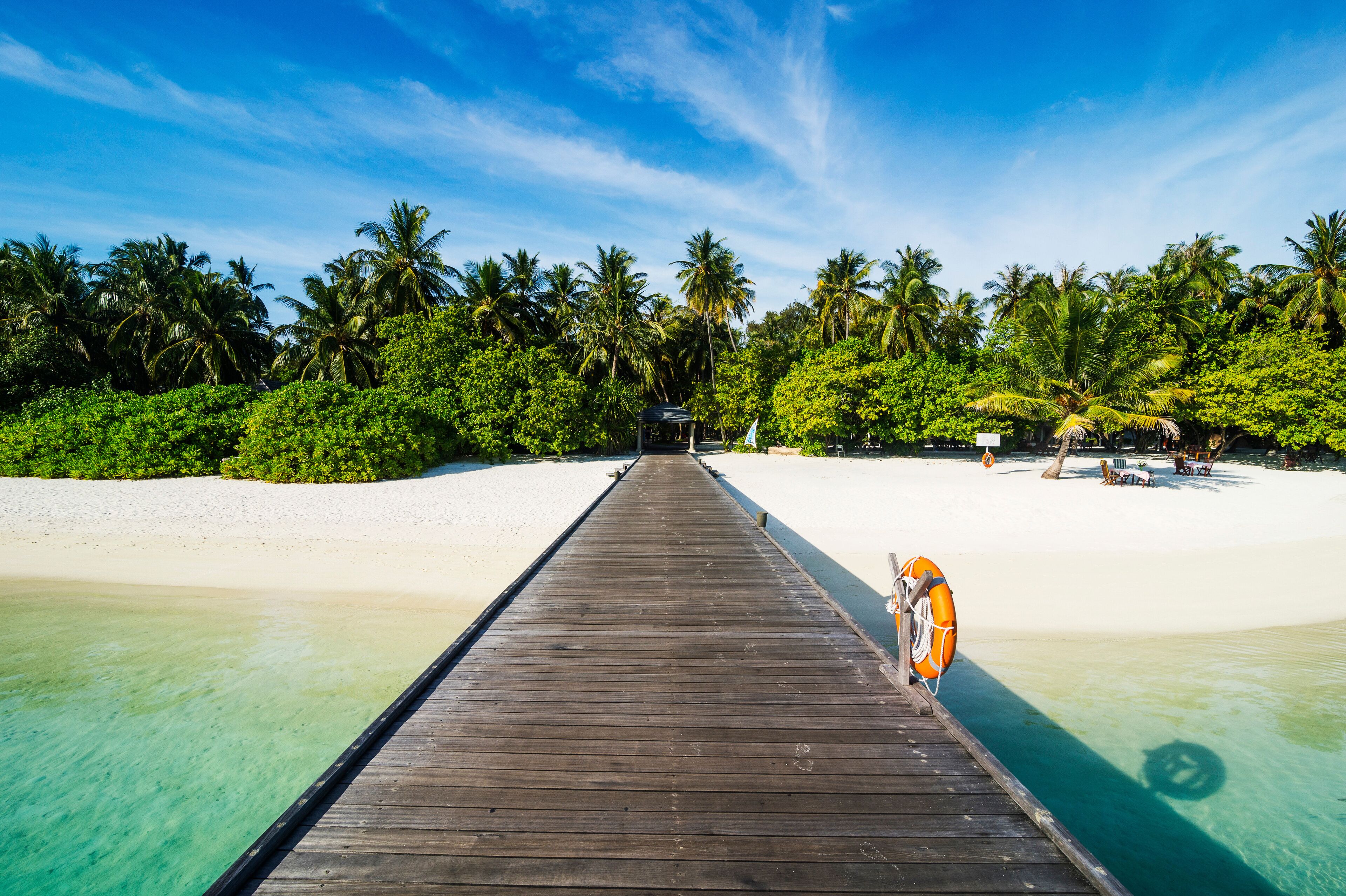 Long pier leading to a small island over turquoise water, Sun Island Resort, Nalaguraidhoo island, Ari atoll, Maldives