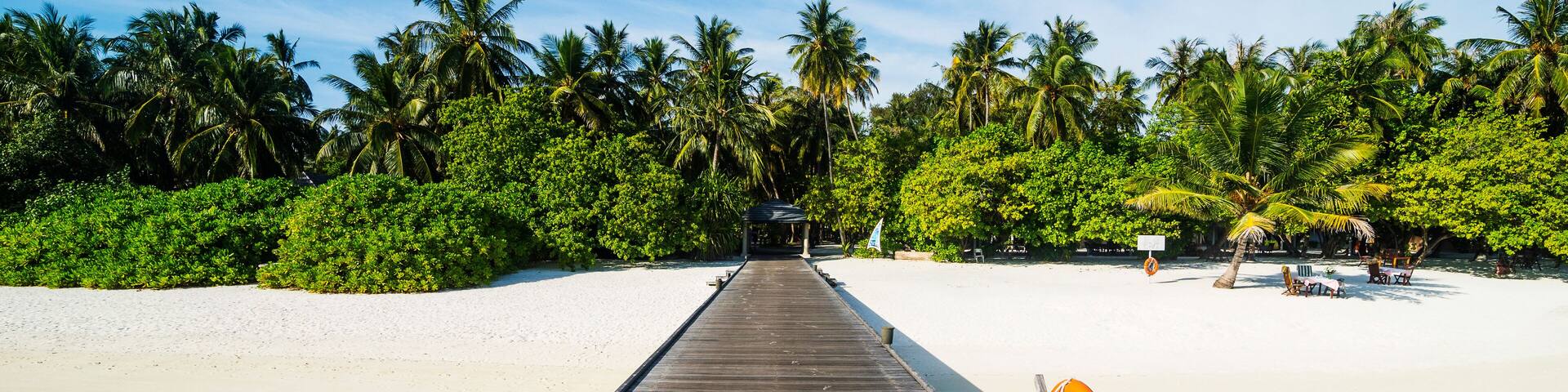 Long pier leading to a small island over turquoise water, Sun Island Resort, Nalaguraidhoo island, Ari atoll, Maldives