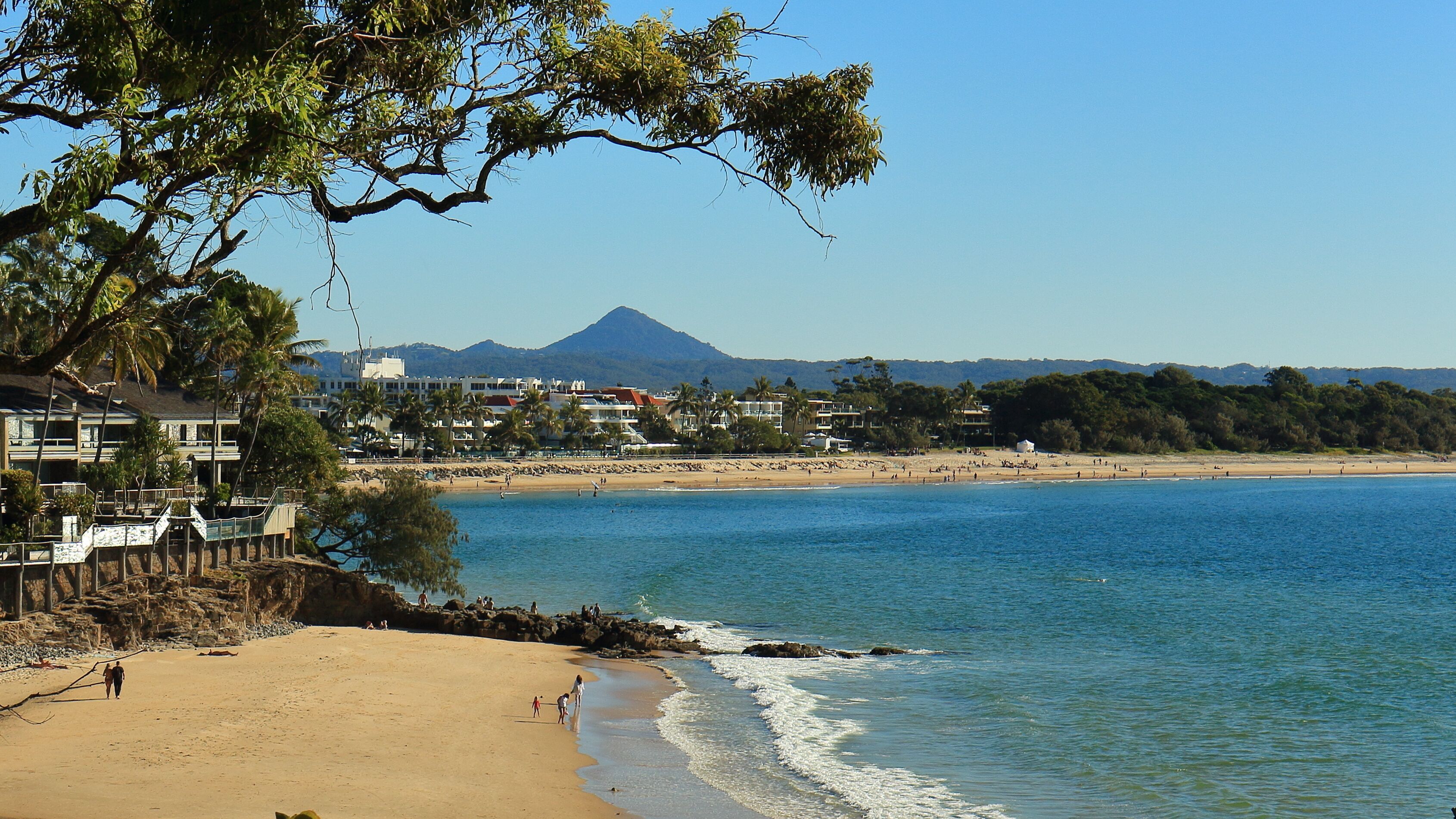 Scenic view of Little Cove Beach and Noosa Heads main beach, with Cooroy Mountain in the background, in July - Sunshine Coast, Queensland, Australia