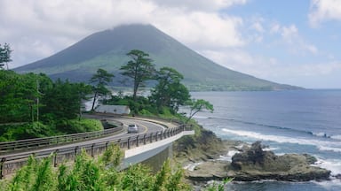 Aerial view of the bay with the highway into volcano mountain in Japan. Kaimondake Mountain, Ibusuki, Kagoshima, 開聞岳 鹿児島県指宿市