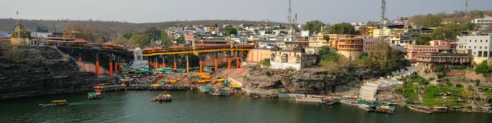 Omkareshwar, India - March 2021: Views of Omkareshwar from Mandhata Island located on the Narmada River on March 20, 2021 in Madhya Pradesh, India.