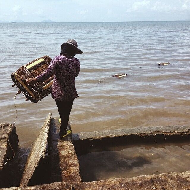 Believe it or not the ones who go out to sea for the crabs are women and they are called the Crab Women of Kep. They sit at the crab market and take the crabs out once you place an order. 1kg is roughly $5-$7.
More on Kep: http://bit.ly/1Bi9yLI