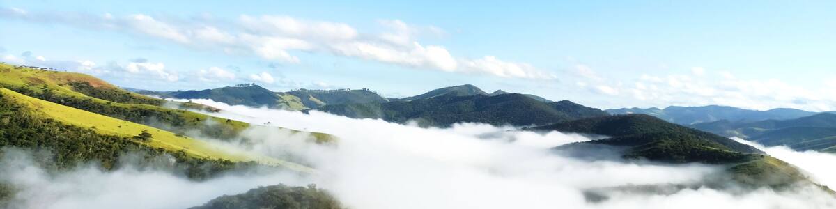 Fog in a dawn in a mountain landscape in the rural area of Itabira, Minas Gerais, Brazil.