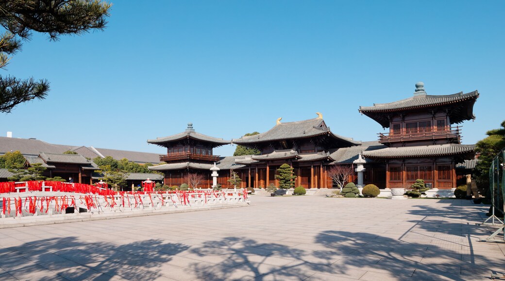 Ancient Tang dynasty style building in Baoshan temple. Buddhist temple located on the banks of the Lianqi River, Baoshan, Shanghai. The Chinese characters on plaque means "palace of buddha".